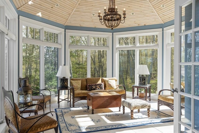 50 Higbee Ln, Boothbay, ME 04571 - sunroom with tile patterned flooring, wood ceiling, and a chandelier