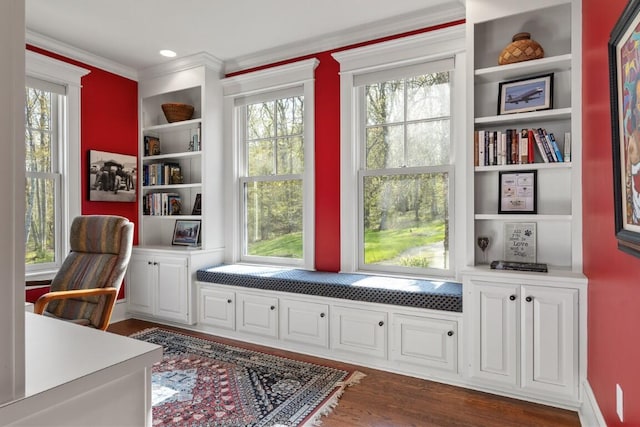 50 Higbee Ln, Boothbay, ME 04571 - office with crown molding, built in shelves, and dark wood-style flooring