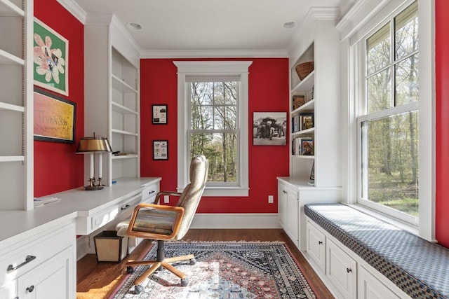 50 Higbee Ln, Boothbay, ME 04571 - home office with dark wood finished floors, ornamental molding, built in study area, built in features, and baseboards