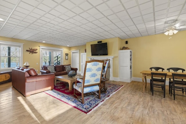 50 Higbee Ln, Boothbay, ME 04571 - living room with wood finished floors, ceiling fan, and baseboards