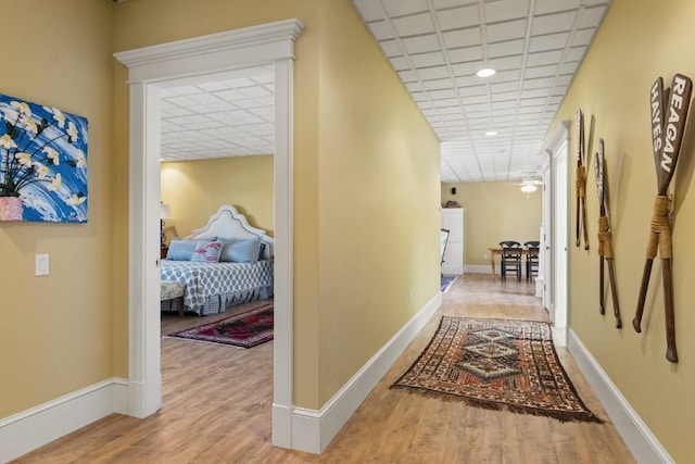 50 Higbee Ln, Boothbay, ME 04571 - corridor featuring wood finished floors, a paneled ceiling, and baseboards
