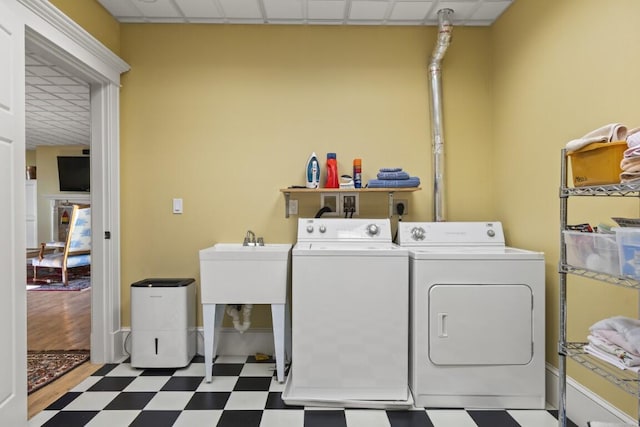 50 Higbee Ln, Boothbay, ME 04571 - washroom with tile patterned floors and washing machine and clothes dryer