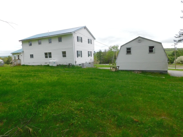 81 S Main St, Athens, ME 04912 - back of house with a lawn