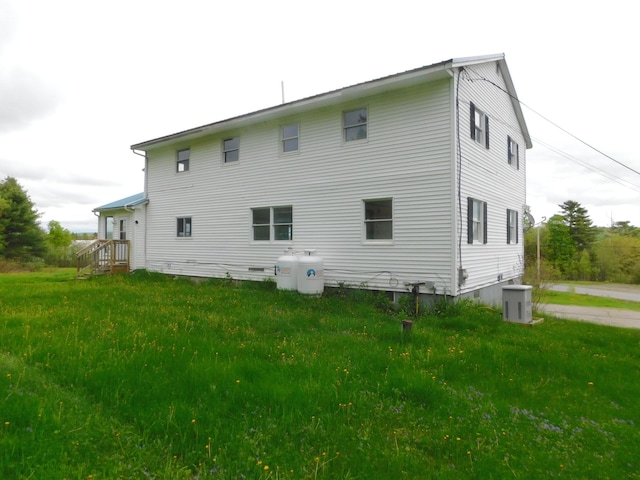 81 S Main St, Athens, ME 04912 - back of house featuring a yard