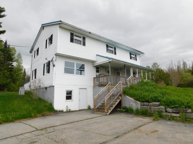 81 S Main St, Athens, ME 04912 - view of front facade with covered porch and stairs