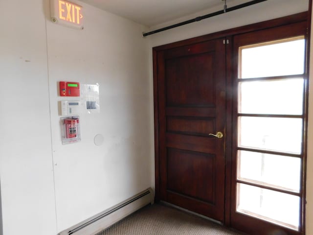 81 S Main St, Athens, ME 04912 - foyer featuring a baseboard heating unit and plenty of natural light