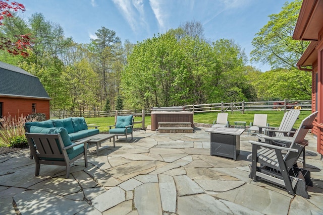70 Cider Hill Rd, York, ME 03909 - fenced backyard featuring an outdoor living space with a fire pit, a patio area, a hot tub, and a wooded view