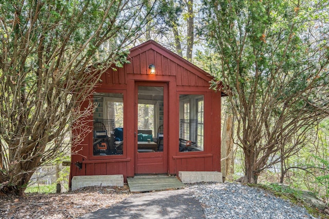 70 Cider Hill Rd, York, ME 03909 - doorway to property featuring board and batten siding