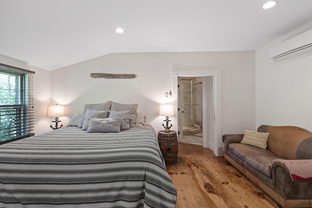 70 Cider Hill Rd, York, ME 03909 - bedroom featuring wood finished floors, an AC wall unit, recessed lighting, and lofted ceiling