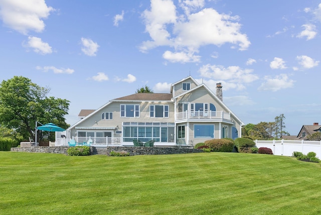 25 Ocean Ave, Cape Elizabeth, ME 04107 - rear view of house featuring a balcony, a chimney, and a sunroom
