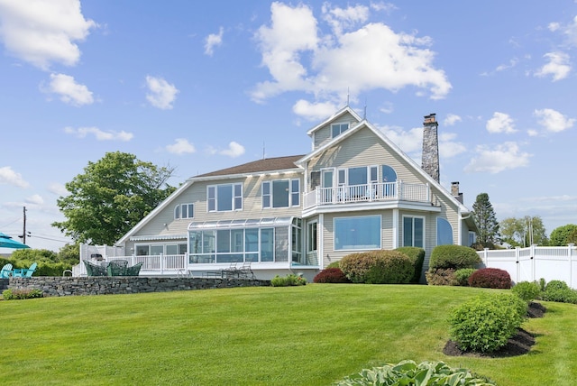 25 Ocean Ave, Cape Elizabeth, ME 04107 - back of property with a chimney, a balcony, and a sunroom