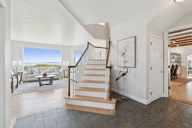 25 Ocean Ave, Cape Elizabeth, ME 04107 - staircase with baseboards and stone tile flooring