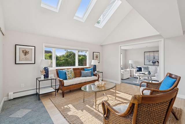 25 Ocean Ave, Cape Elizabeth, ME 04107 - living area with a skylight, a baseboard radiator, high vaulted ceiling, baseboards, and wood finished floors