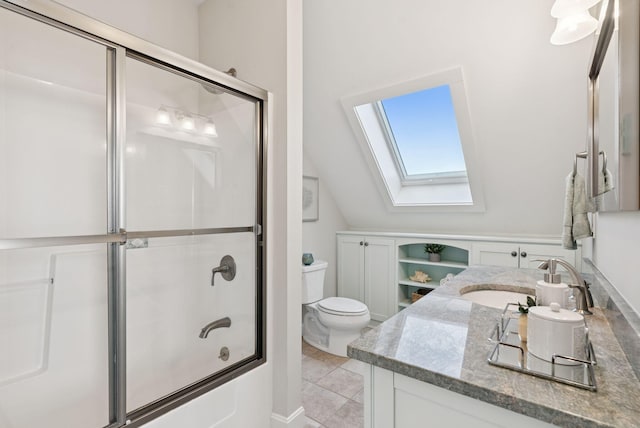 25 Ocean Ave, Cape Elizabeth, ME 04107 - full bathroom featuring a skylight, vanity, toilet, shower / bath combination with glass door, and lofted ceiling