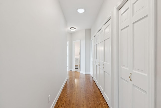 25 Ocean Ave, Cape Elizabeth, ME 04107 - hallway featuring wood finished floors and baseboards