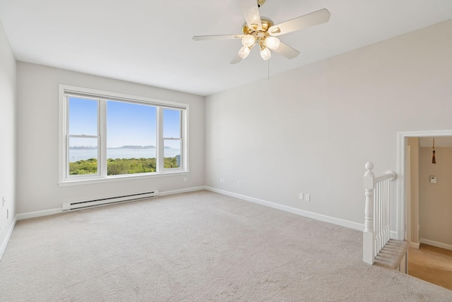 25 Ocean Ave, Cape Elizabeth, ME 04107 - unfurnished room featuring a baseboard heating unit, carpet floors, baseboards, and ceiling fan