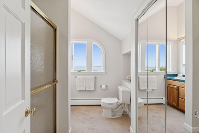 25 Ocean Ave, Cape Elizabeth, ME 04107 - bathroom with baseboard heating, toilet, vaulted ceiling, vanity, and an enclosed shower