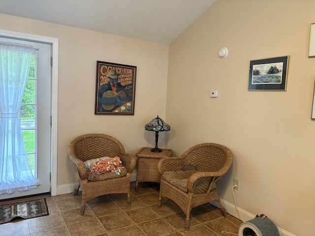 282 Pierces Point Rd, Windsor, ME 04363 - sitting room with baseboards, tile patterned floors, and lofted ceiling