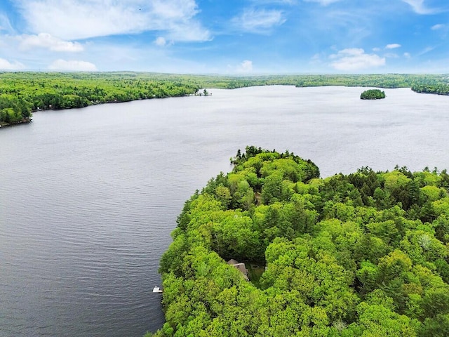 282 Pierces Point Rd, Windsor, ME 04363 - drone / aerial view of a nearby body of water and a heavily wooded area