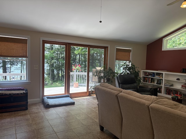 282 Pierces Point Rd, Windsor, ME 04363 - tiled living area featuring lofted ceiling, a ceiling fan, and baseboards