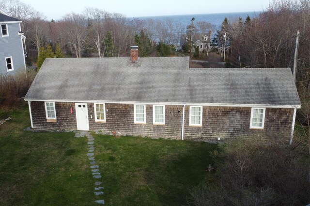 42 Old Mill Rd, Bristol, ME 04554 - new england style home with a chimney, a front lawn, and roof with shingles