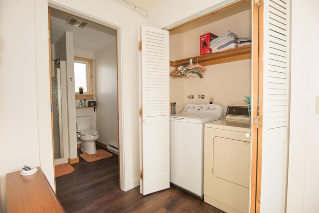42 Old Mill Rd, Bristol, ME 04554 - laundry room with washer and dryer, baseboard heating, and dark wood-style floors
