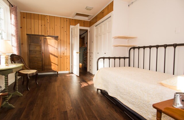 42 Old Mill Rd, Bristol, ME 04554 - bedroom with wood finished floors, ornamental molding, attic access, wooden walls, and a closet