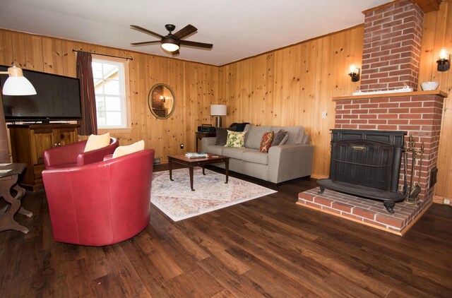 42 Old Mill Rd, Bristol, ME 04554 - living room with wood walls, ceiling fan, and wood finished floors