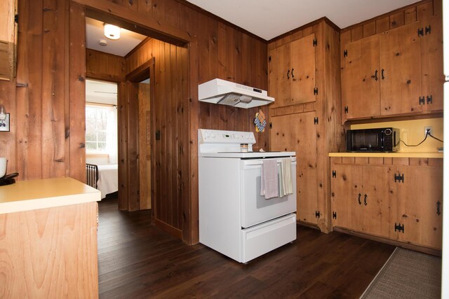42 Old Mill Rd, Bristol, ME 04554 - kitchen with white electric range, black microwave, under cabinet range hood, wood walls, and dark wood finished floors