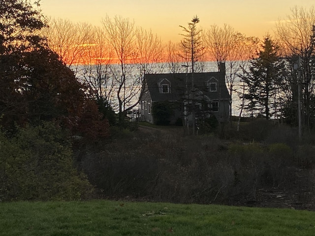42 Old Mill Rd, Bristol, ME 04554 - yard at dusk with a water view