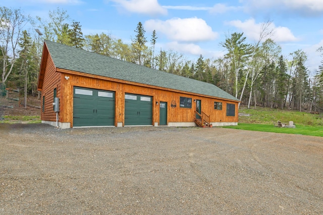 3935 Main St, Rangeley, ME 04970 - garage featuring dirt driveway