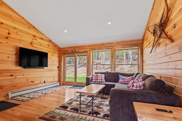 3935 Main St, Rangeley, ME 04970 - living area featuring a baseboard radiator, wood walls, lofted ceiling, wood finished floors, and recessed lighting