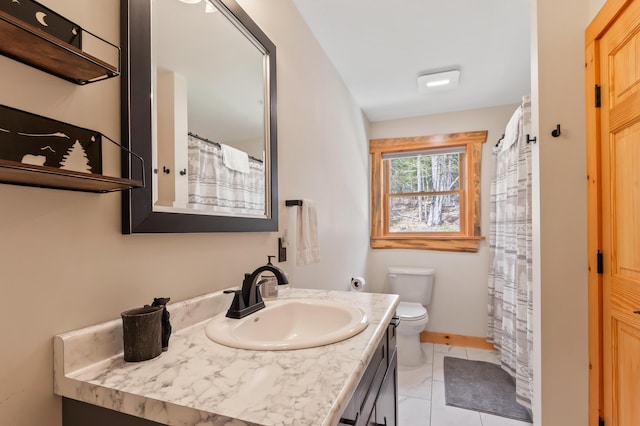 3935 Main St, Rangeley, ME 04970 - full bathroom featuring vanity, toilet, and baseboards