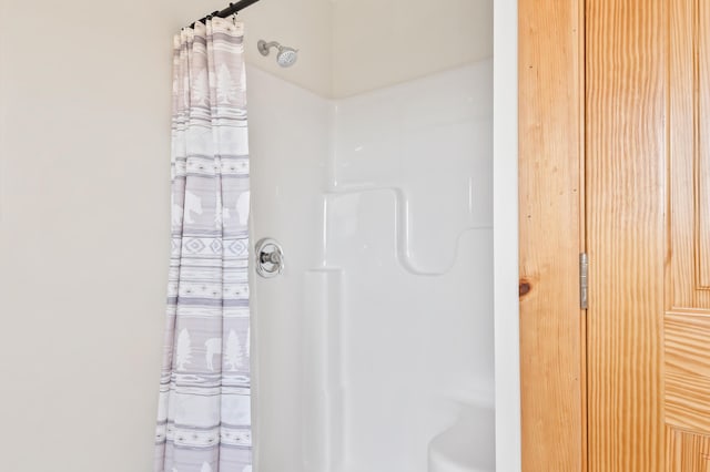 3935 Main St, Rangeley, ME 04970 - bathroom featuring a shower with curtain