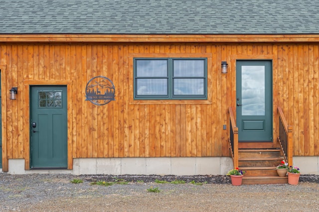 3935 Main St, Rangeley, ME 04970 - entrance to property featuring a shingled roof