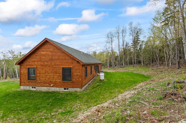 3935 Main St, Rangeley, ME 04970 - view of property exterior with a lawn and faux log siding