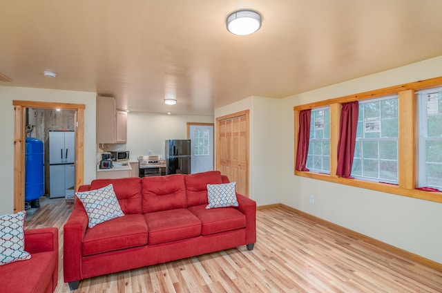 22 Partridge Ln, Medford, ME 04463 - living room featuring light wood finished floors and baseboards