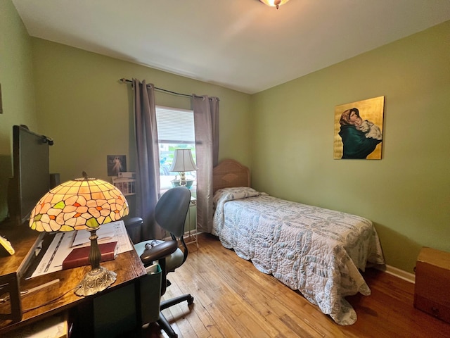 13 Pearl St, Fort Kent, ME 04743 - bedroom featuring hardwood / wood-style floors, a desk, and baseboards