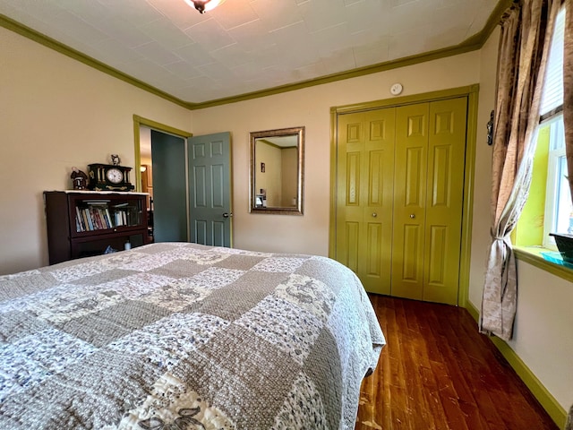 13 Pearl St, Fort Kent, ME 04743 - bedroom featuring ornamental molding, dark wood-style flooring, a closet, and baseboards