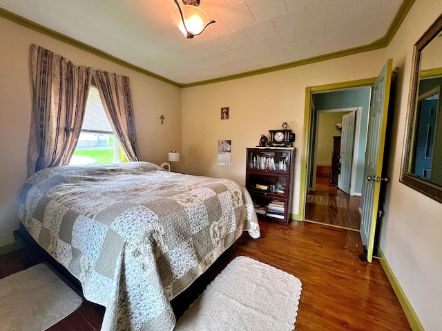 13 Pearl St, Fort Kent, ME 04743 - bedroom featuring ornamental molding, wood finished floors, and baseboards