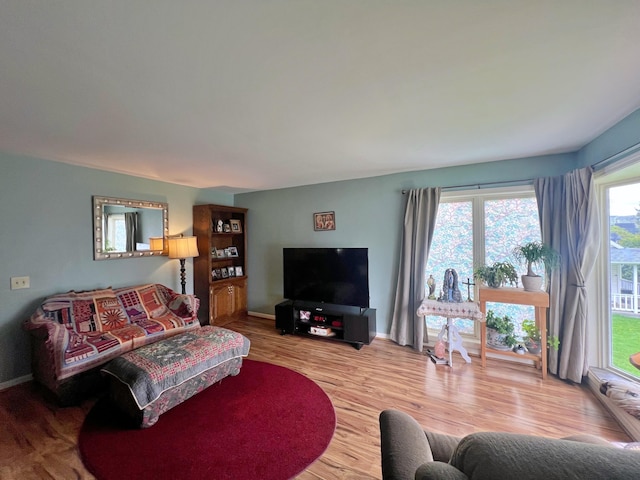13 Pearl St, Fort Kent, ME 04743 - living room featuring wood finished floors and baseboards
