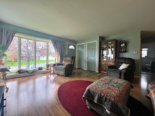 13 Pearl St, Fort Kent, ME 04743 - living room with healthy amount of natural light and wood finished floors