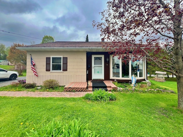 13 Pearl St, Fort Kent, ME 04743 - bungalow-style home with a front yard