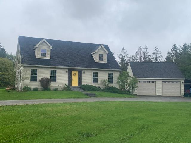 196 Lambert Rd, Brewer, ME 04412 - cape cod home with a front yard, entry steps, and driveway