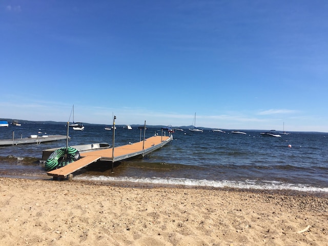 18 Julian St, Sebago, ME 04029 - dock area featuring view of water and beach