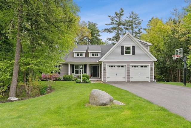 45 S Ridge Rd, Falmouth, ME 04105 - traditional home with driveway, a front lawn, a garage, and a porch