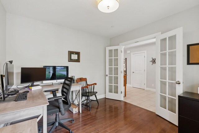 45 S Ridge Rd, Falmouth, ME 04105 - home office featuring french doors, wood finished floors, and baseboards