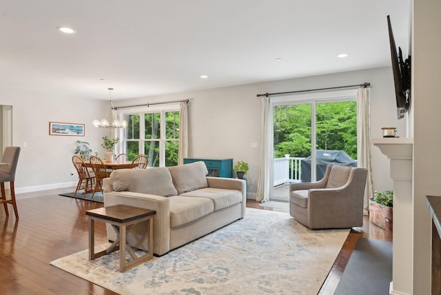 45 S Ridge Rd, Falmouth, ME 04105 - living room featuring plenty of natural light, hardwood / wood-style flooring, recessed lighting, a chandelier, and baseboards