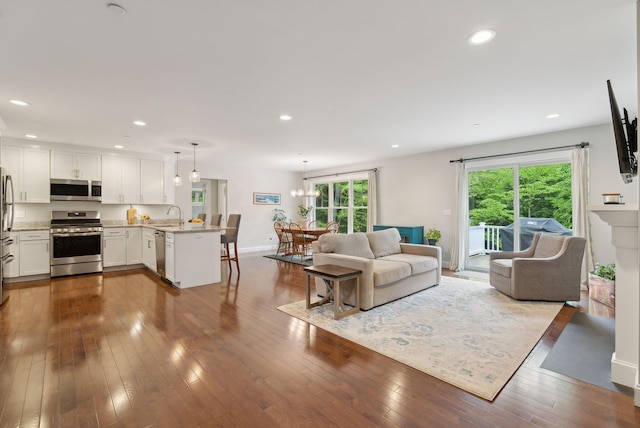 45 S Ridge Rd, Falmouth, ME 04105 - living area featuring dark wood-type flooring, recessed lighting, and baseboards