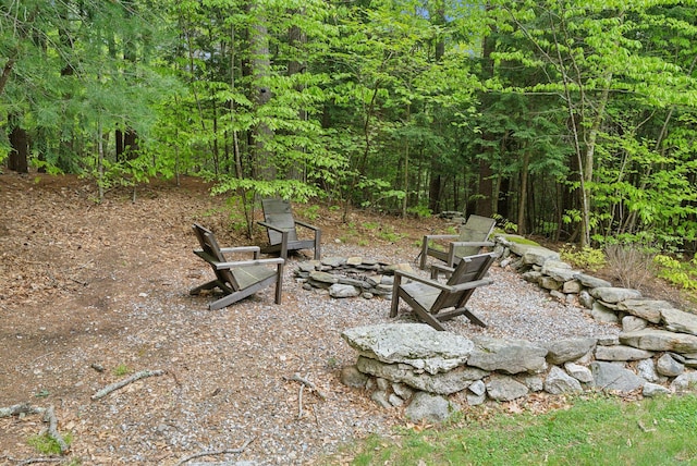 45 S Ridge Rd, Falmouth, ME 04105 - view of yard featuring a fire pit and a wooded view